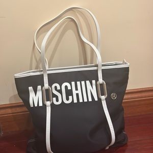 Moschino bag light weight.   Use every day or as bench bag new 1 time use